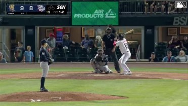 Velazquez barehands a deflection off the pitcher