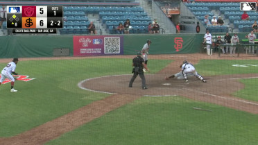 Lisbel Diaz cuts down the run at the plate