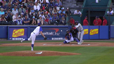 Trenton Wallace makes an catch at the mound
