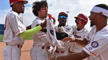 Indians Edge Hops in Extra-Inning Thriller