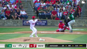 Nick Montgomery homers (1) on a fly ball to left field.