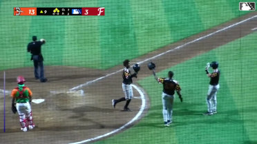 Leandro Arias connects on a grand slam