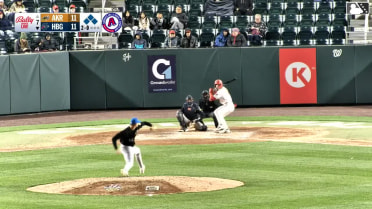 Cayden Wallace homers (1) on a fly ball to left center field.