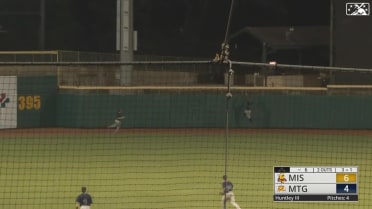Justin Dean scales the wall for the catch