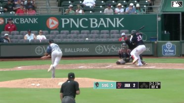 Brian Navarreto homers (1) on a line drive to left center field.