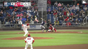 Jorge Burgos triples (1) on a line drive to center fielder Miguel Bleis.