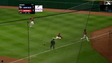 Baker races to right field to make a sliding catch 