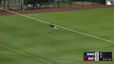 Chase Davis goes airborne to make a diving grab