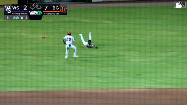 Ryan Spikes races in and makes a diving catch