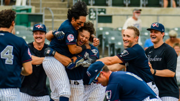 Flores' Walk-Off Blast In Extras Clinches Patriots Fifth Straight Win