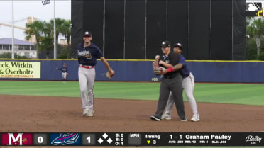 Horne, Mejia hug the umpire after recording an out