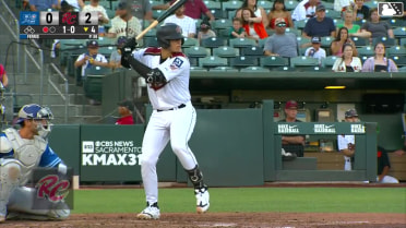 Adrián Sugastey homers (1) on a fly ball to left field.
