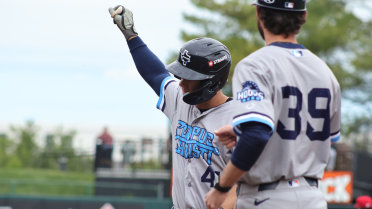 Austin Goes Deep Twice, Hooks Bounce Back in Rain-Shortened Affair