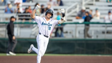 Josh Caron homers (15) on a fly ball to center field.