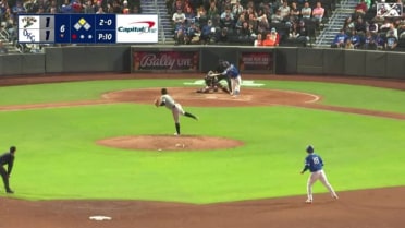 Dodgers outfielder Jonny Deluca hits an RBI single