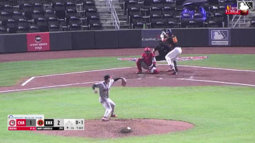 Andy Garriola homers (13) on a fly ball to left field.