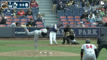 Travis Bazzana lines a triple to right field