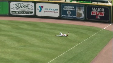 Connor Kokx makes the diving catch in right