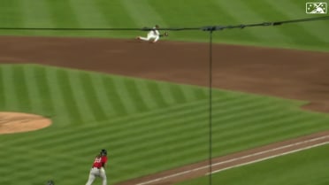 Darren Baker makes a diving play in the 7th