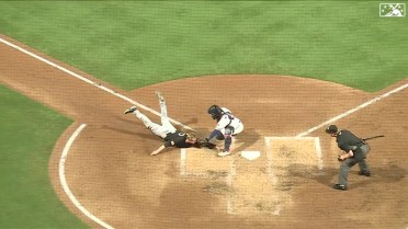 Aces nail runner at the plate