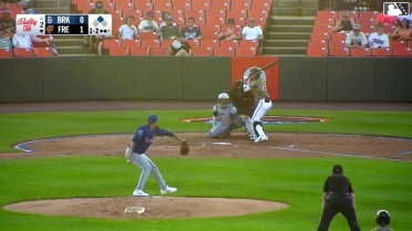 Alfredo Velásquez singles on a fly ball to center fielder John Bay. Edwin Amparo scores.