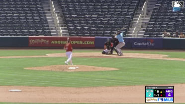 Shay Whitcomb out on a sacrifice fly to left fielder Adael Amador. Raynel Delgado scores.