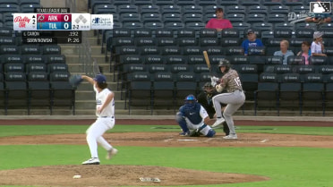 Josh Caron homers (1) on a fly ball to right field.