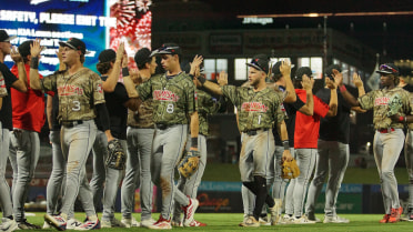 Sloan and Smith Shoot Travs Past Tulsa