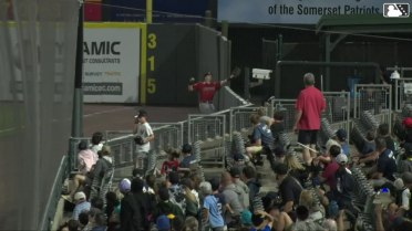 Ben Malgeri makes catch and flips over the wall