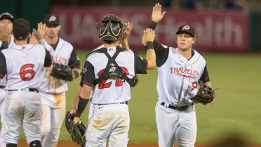 Travs Rally to Win Final Series Opener