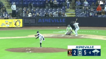 Colin Burgess homers (1) on a fly ball to center field.