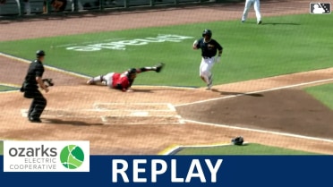 Rudy Martin scores from second base on a sac fly