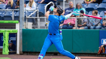 Josh Caron homers (5) on a fly ball to left field.