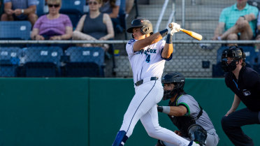Brandon Eike homers (18) on a fly ball to center field.