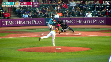 Cesar Prieto bounces a two-run single to right field