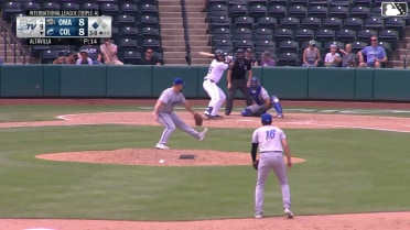 Ralphy Velazquez singles on a ground ball to center fielder John Rave. Dayan Frias scores.