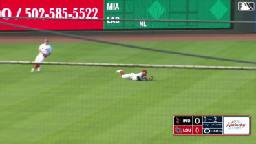 Blake Dunn lays out to make a catch in left field 