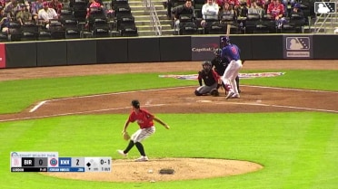 Jordan Nwogu singles on a ground ball to left fielder Jacob Burke. Karson Simas scores.
