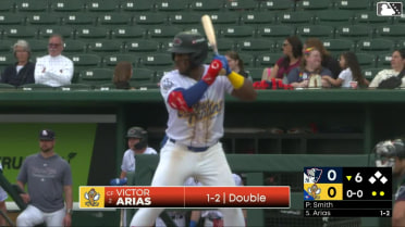 Victor Arias homers (6) on a fly ball to right field.