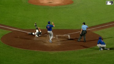 Andrew Pinckney nabs runner at home for a double play