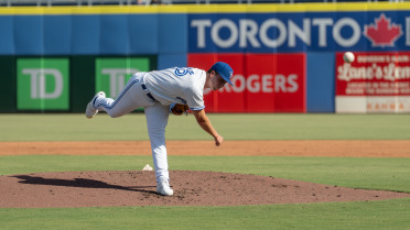 Scannell Homers, Wilkerson Strong in Doubleheader Defeat