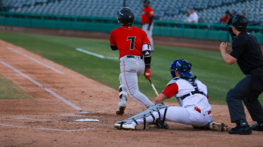 Grizzlies Cling to 9-8 Victory After Holliday Slam