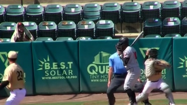 Alberto Barriga throws out a runner