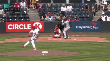 Josh Caron homers (11) on a fly ball to center field.