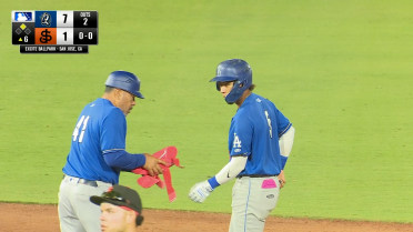 Eduardo Quintero plates a run on a double