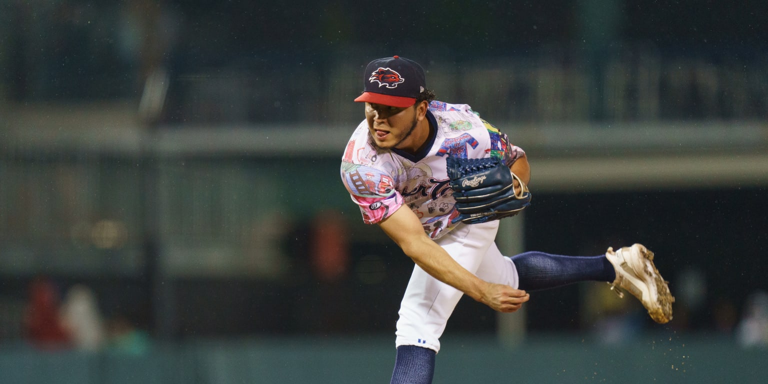 Dodgers endure long rain delay to earn win over Nats