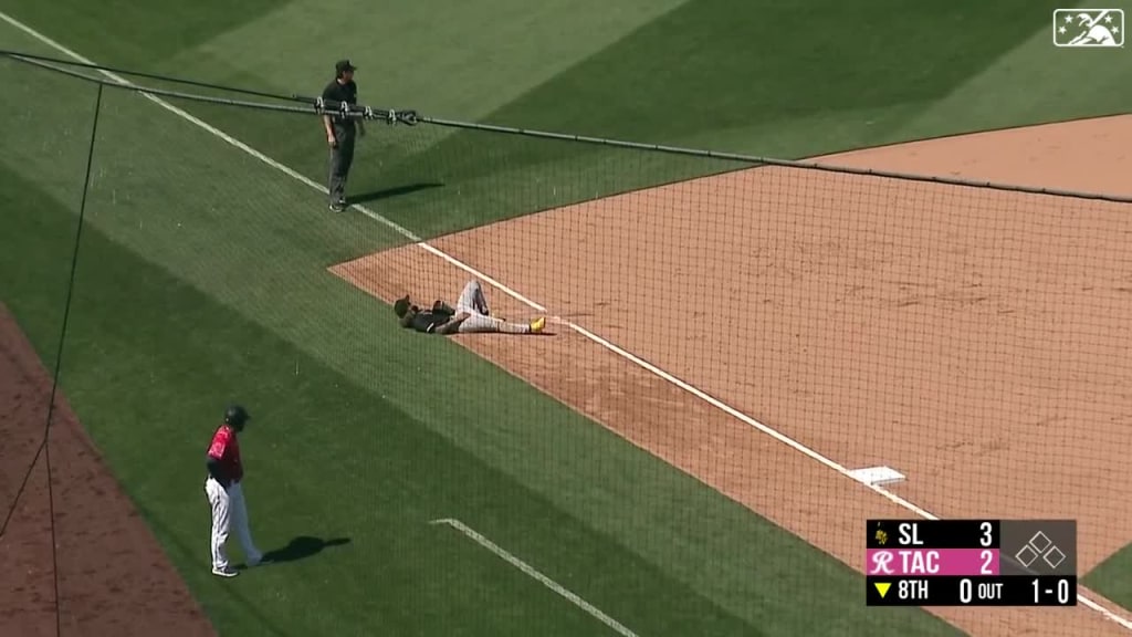  Baseball Player Diving to Catch Ball in Stadium Photo