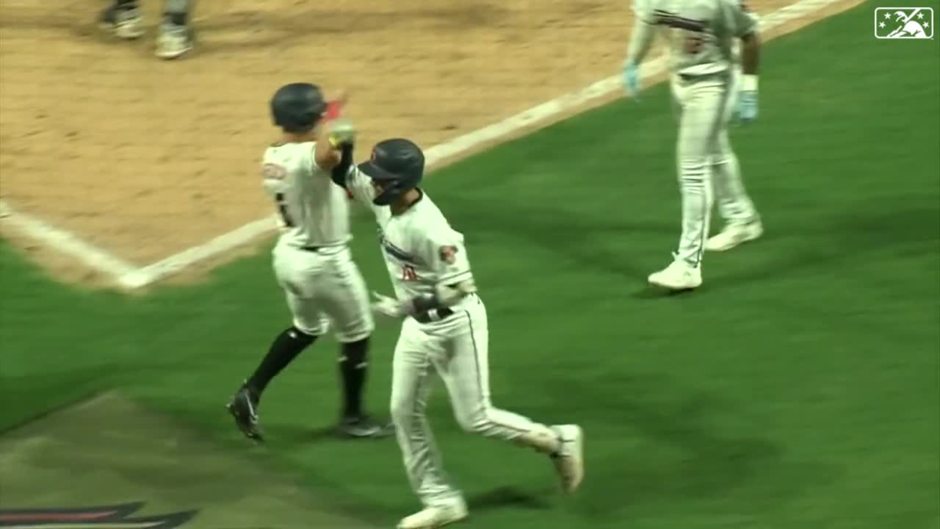 Jordan Groshans of the Miami Marlins walks off the field between