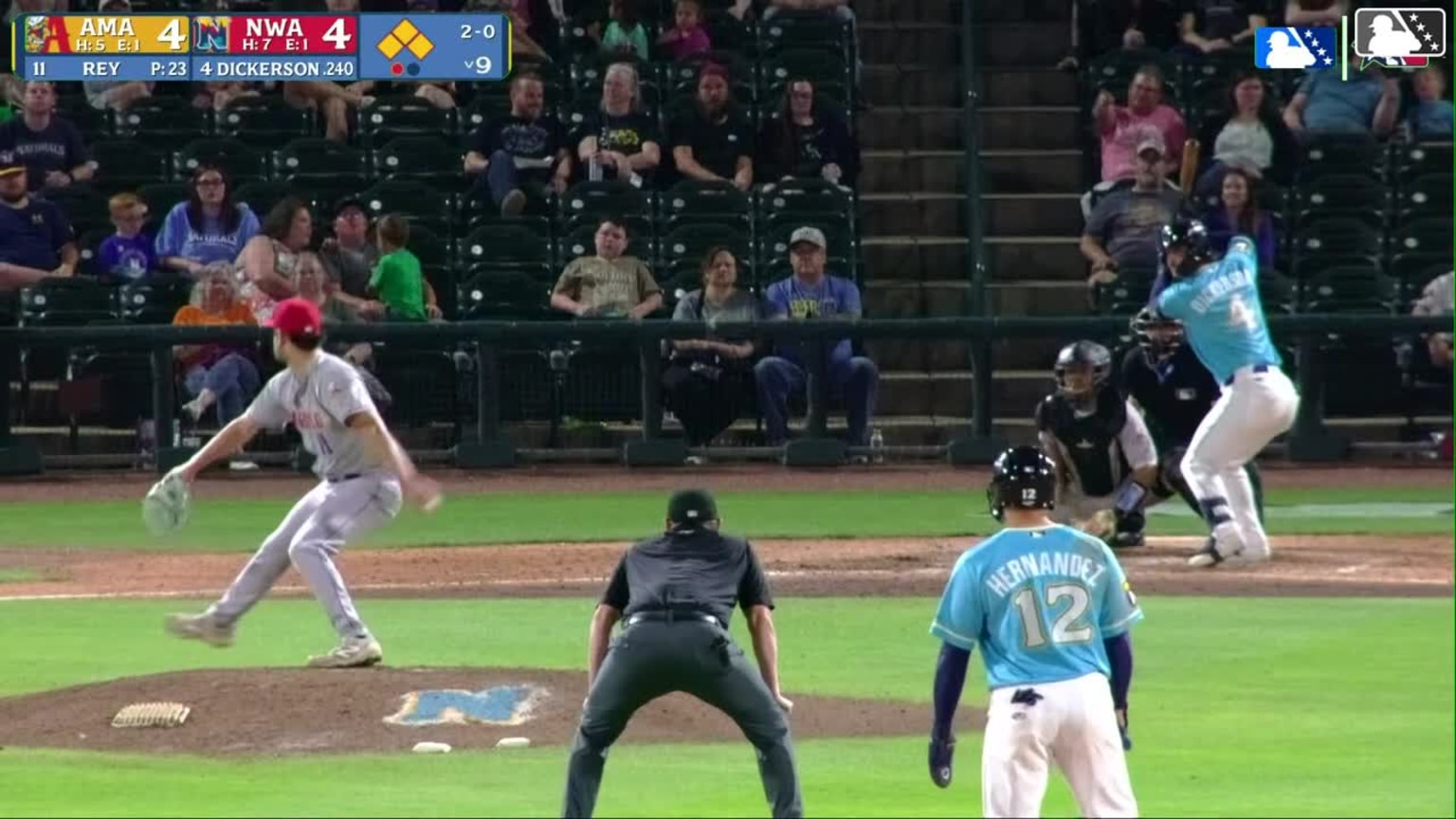 Dustin Dickerson singles on a sharp line drive to center fielder Junior ...