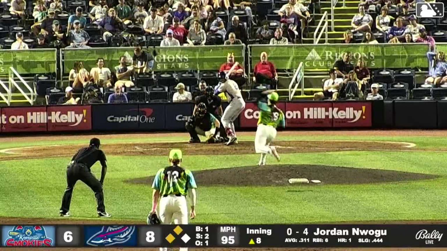 Jordan Nwogu singles on a ground ball to third baseman Ian Lewis Jr ...